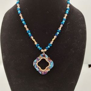 Glass beads with fun enamel pendant